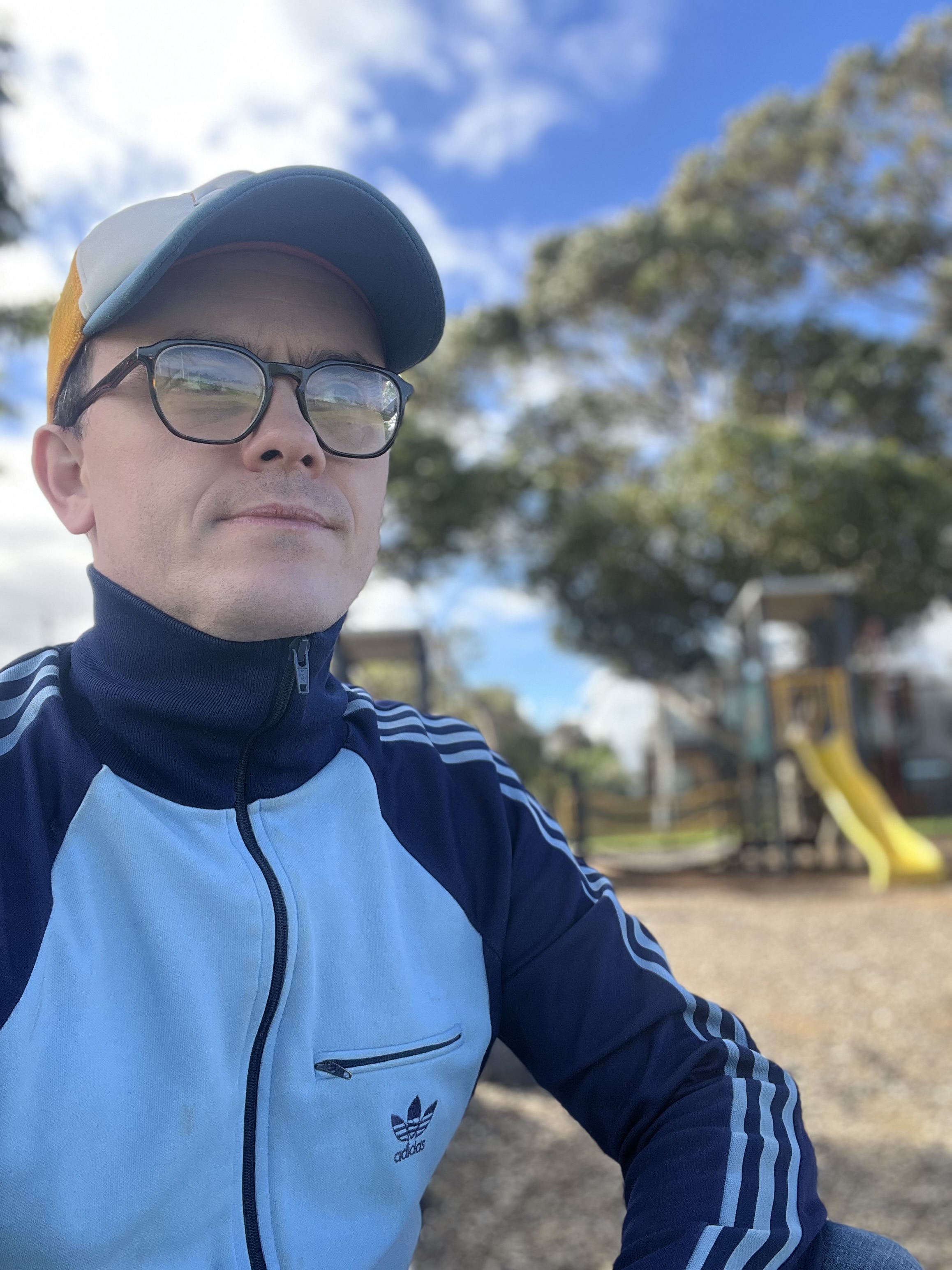 Max in a playground looking away